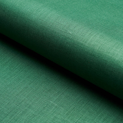 Green linen-like fabric rolled, close-up weave texture with soft matte finish.