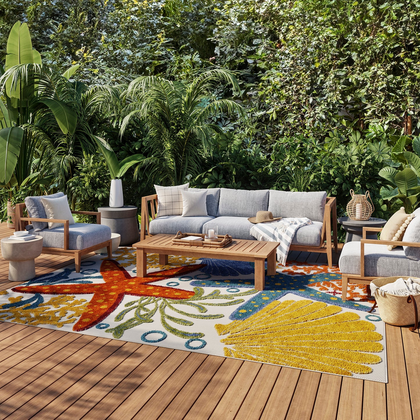 Coastal rug with sun and starfish motifs, 6' x 9'.