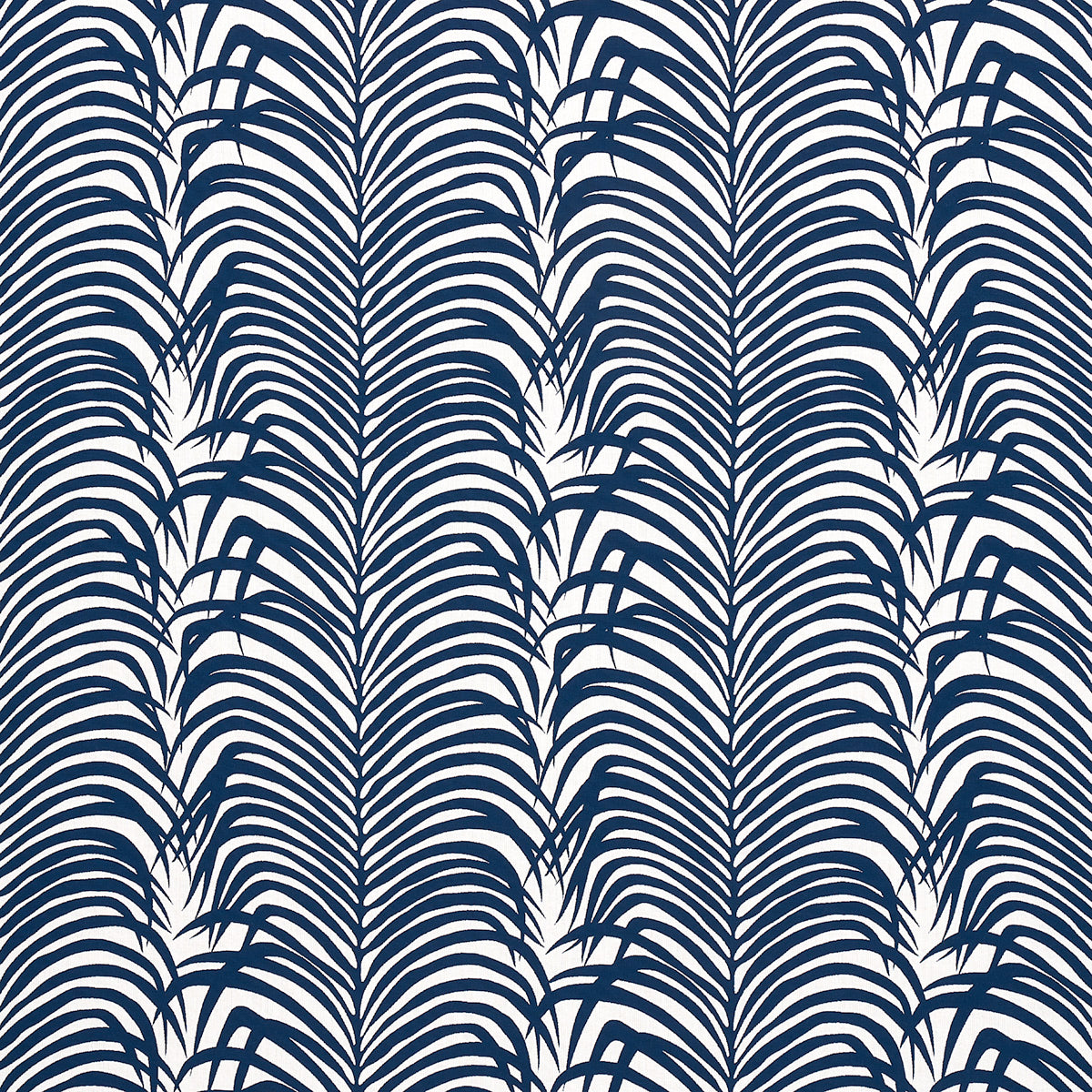 Blue-gray solid panel with a navy palm-leaf patterned border on the right, tropical wallpaper/fabric design.