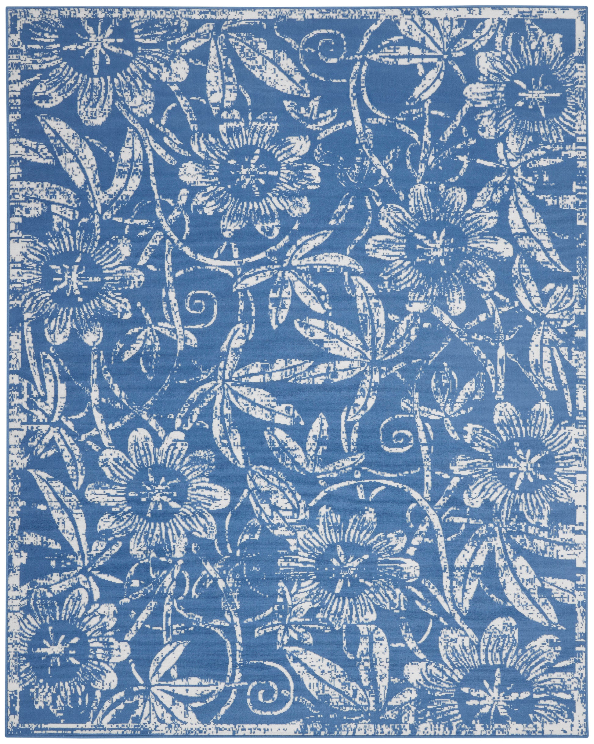 Blue fabric with white intricate floral damask pattern and border, decorative textile.