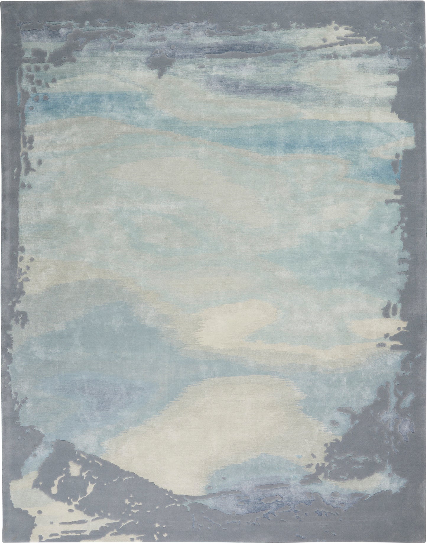 Soft blue-gray abstract area rug with cloudlike pale blue and ivory patches and a dark gray border.