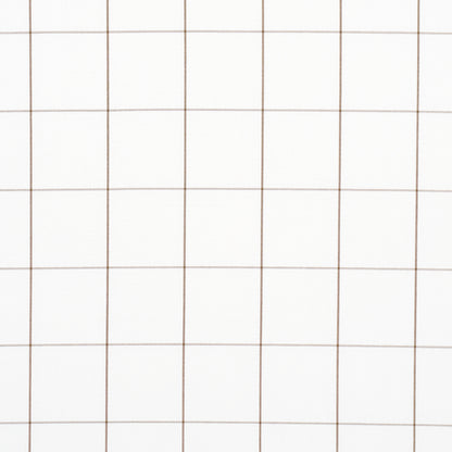 Cream graph paper texture with brown grid lines creating a square lattice; minimalist stationery background.
