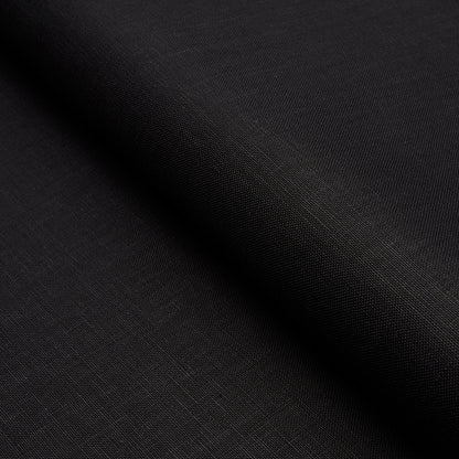 Black fabric with smooth matte weave and diagonal fold; versatile for clothing or upholstery.