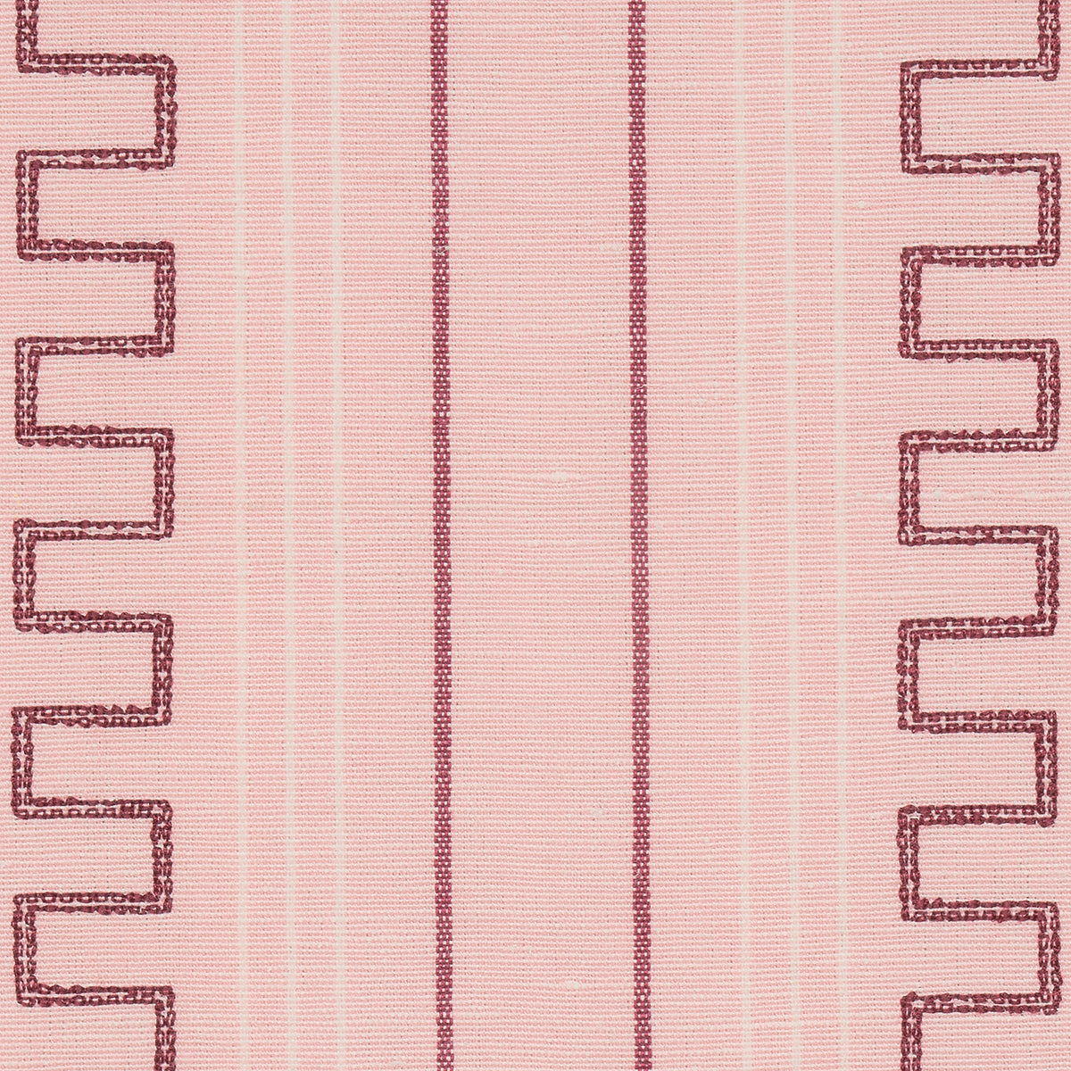 Pink striped textile with pale pink background, central dark magenta vertical stripe, and zigzag borders on both sides.