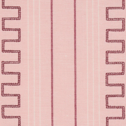 Pink striped textile with pale pink background, central dark magenta vertical stripe, and zigzag borders on both sides.