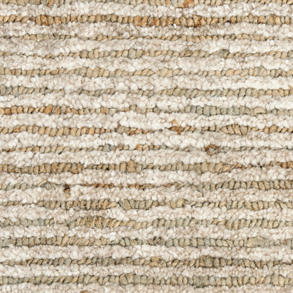 Cream and beige loop-pile rug with chunky textured yarns in tan and ivory tones.