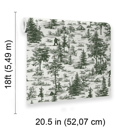 Wallpaper roll with forest toile pattern in dark green on ivory, featuring trees, tents and campers; vintage woodland decor.