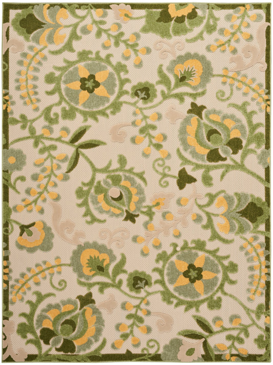 Rectangular rug with cream background and green-yellow floral trellis pattern, ornate vines and circular blossoms.