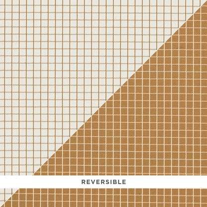 Reversible grid-pattern fabric: beige-white upper half and warm brown lower half separated by a diagonal split.