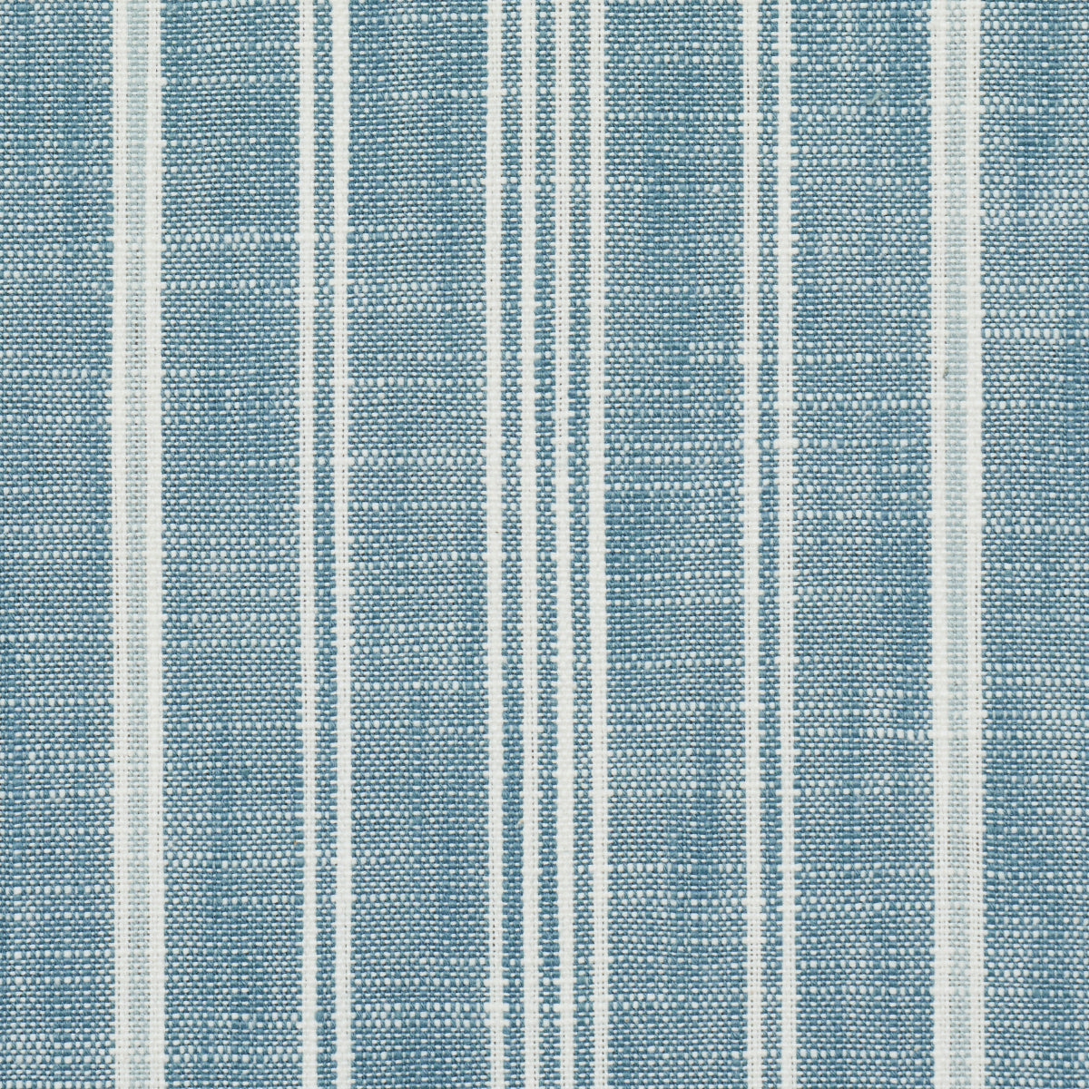 Blue woven fabric with vertical white stripes in varying widths, textile texture.