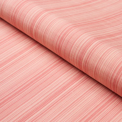 Coral-pink striped fabric roll with thin red lines, soft linen-like textile for clothing or home decor.