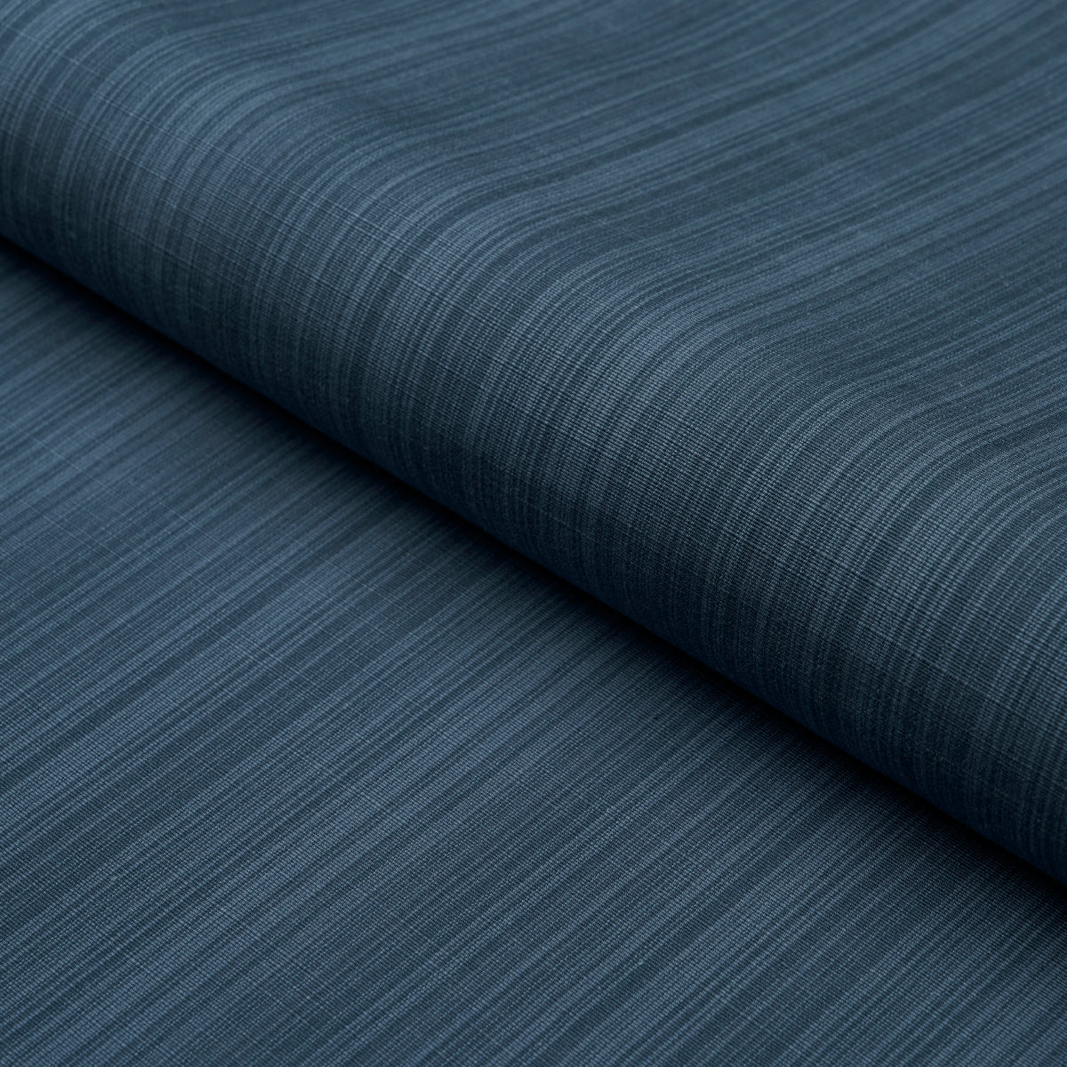 Rolled dark blue striped woven fabric with fine texture.