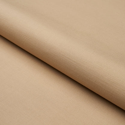 Beige fabric roll with a smooth weave and soft drape, folded diagonally.