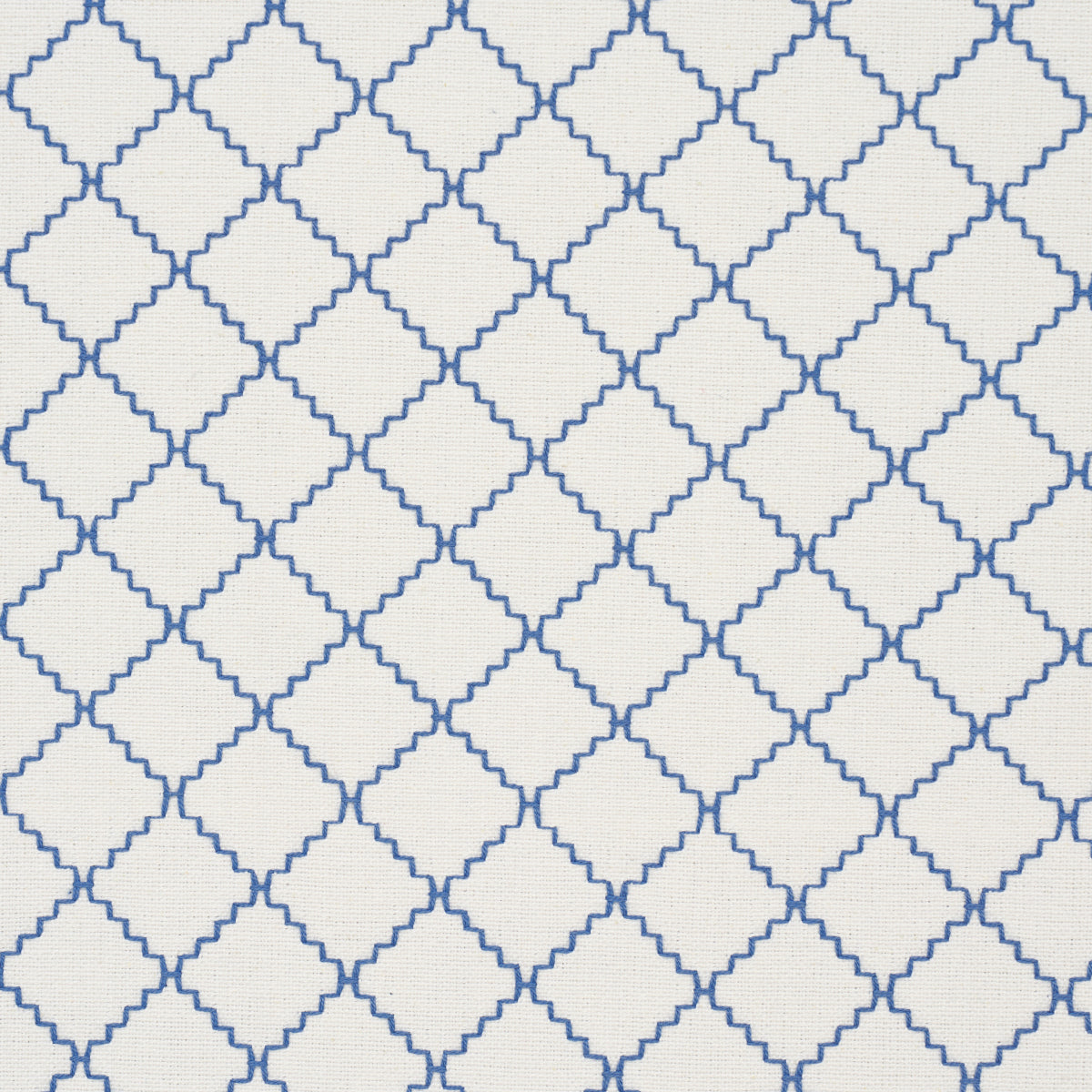 Indigo lattice-woven fabric featuring a geometric pattern of interconnected diamond and quatrefoil shapes.