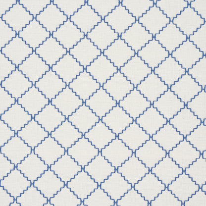 Indigo lattice-woven fabric featuring a geometric pattern of interconnected diamond and quatrefoil shapes.