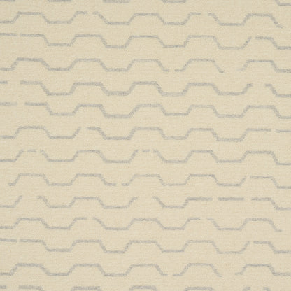 Beige textured fabric with pale gray stepped zigzag pattern in horizontal rows.
