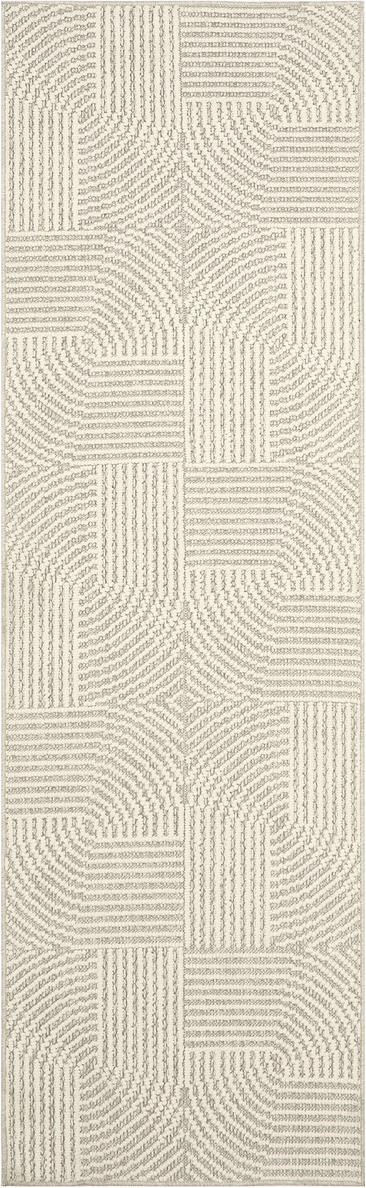 Beige rectangular rug with boucle texture and geometric patchwork of straight and curved lines.
