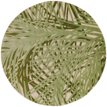 Round rug with sage and olive palm-leaf pattern on beige background; tropical, contemporary decor.