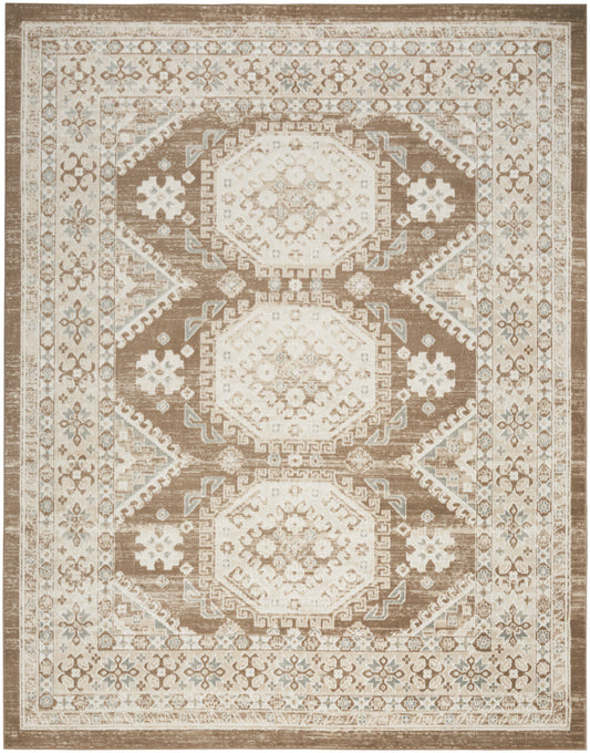 Distressed beige-brown oriental area rug with three central ivory hexagonal medallions and floral border.