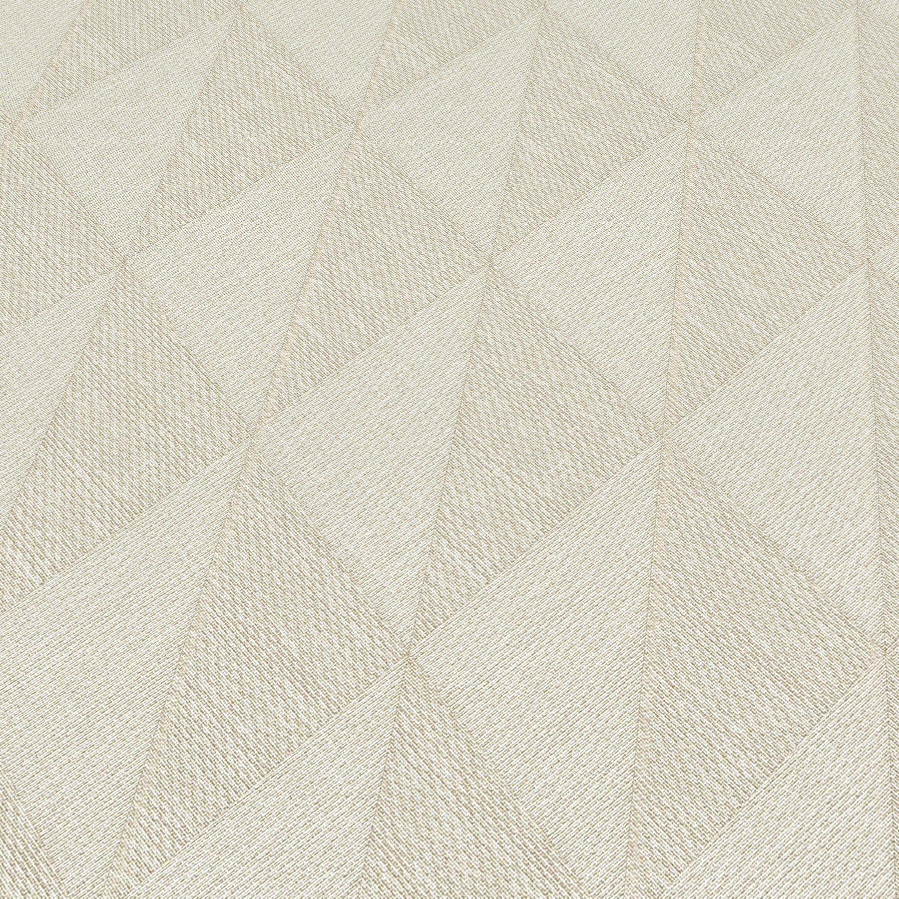 Cream textured fabric with geometric triangular facets; quilted look for upholstery or cushions.