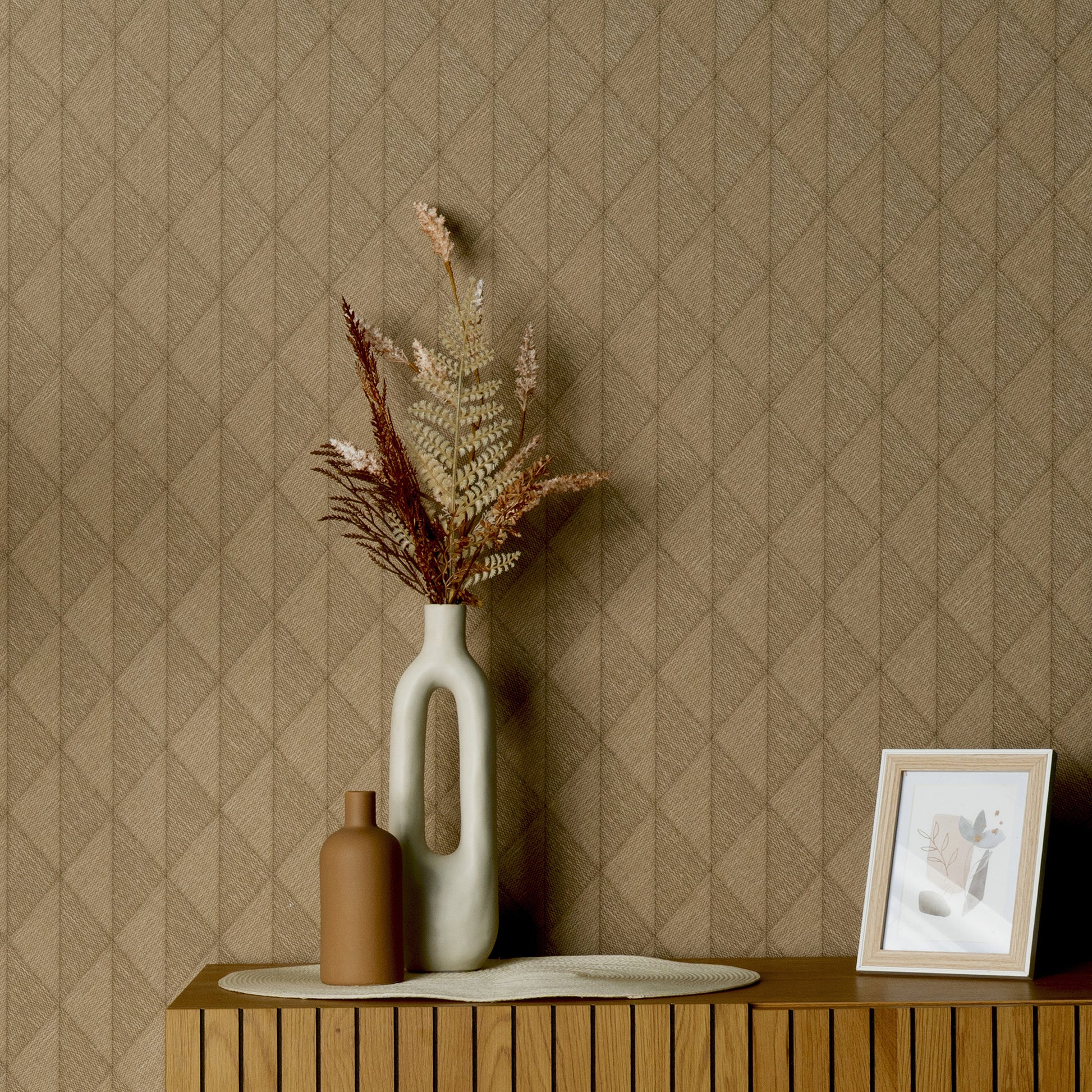 Yellow woven diamond wallpaper pattern on a wall.