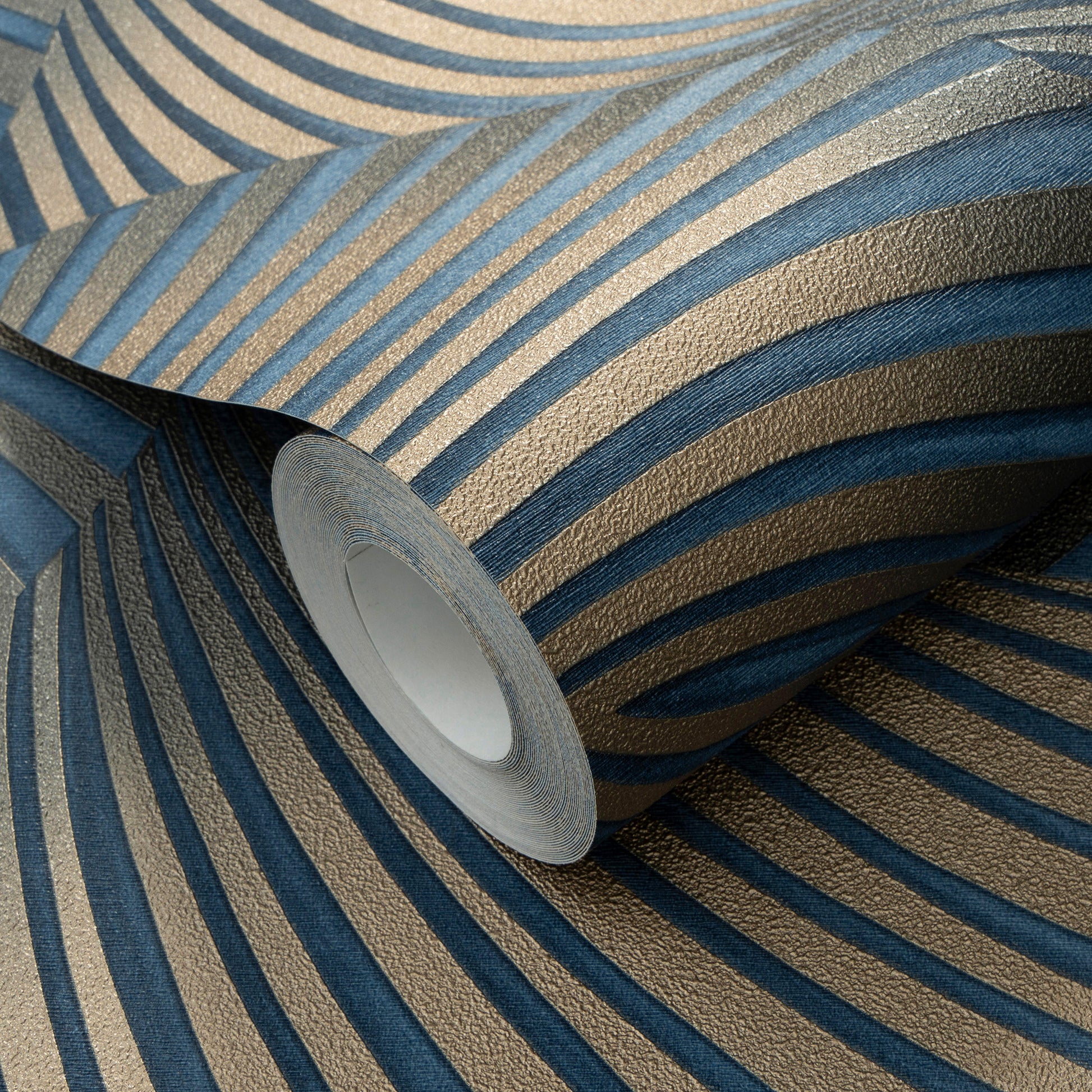 Roll of blue twill wallpaper with a textured finish and exposed core