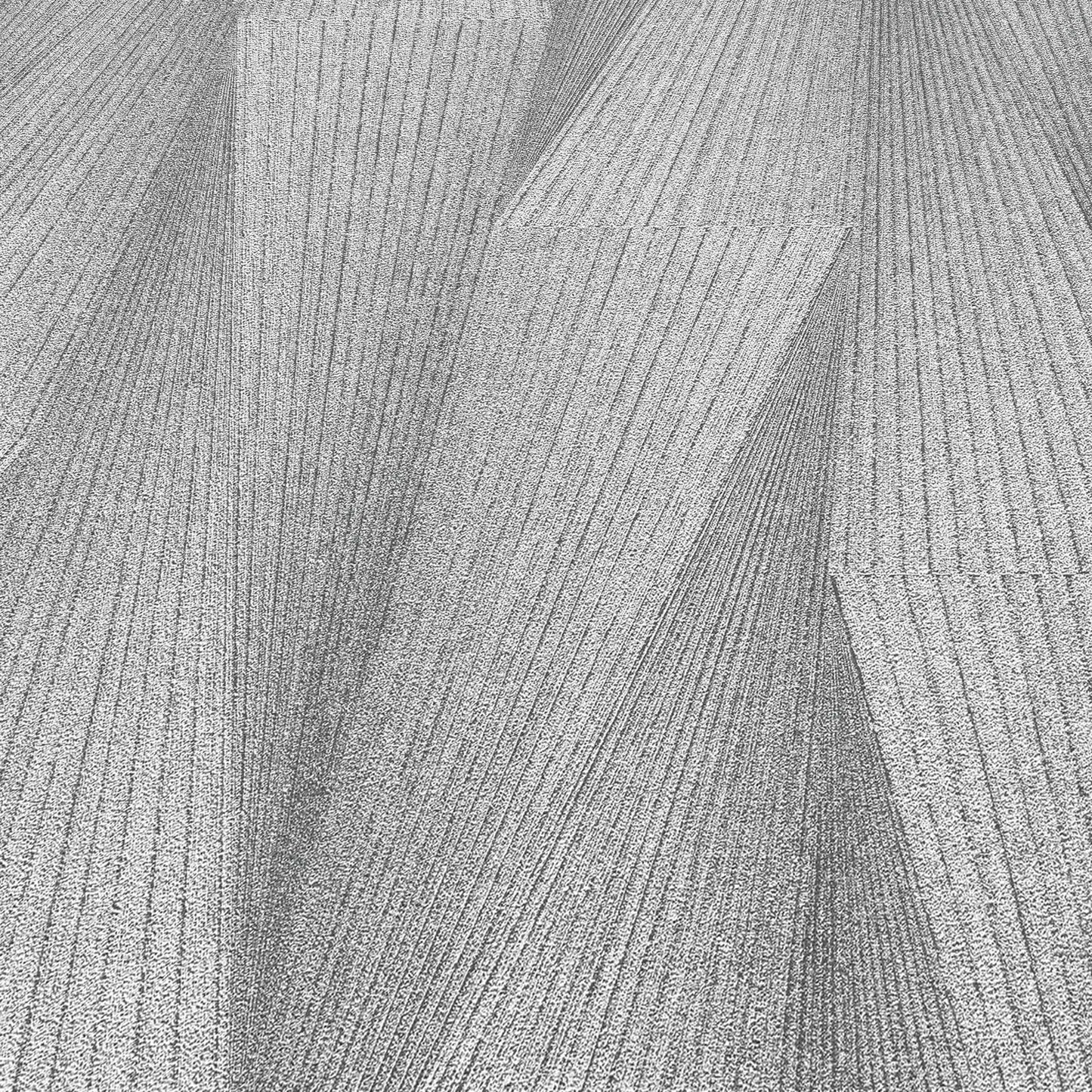 Gray wallpaper close-up with a subtle textured pattern and soft tonal variation across the surface.