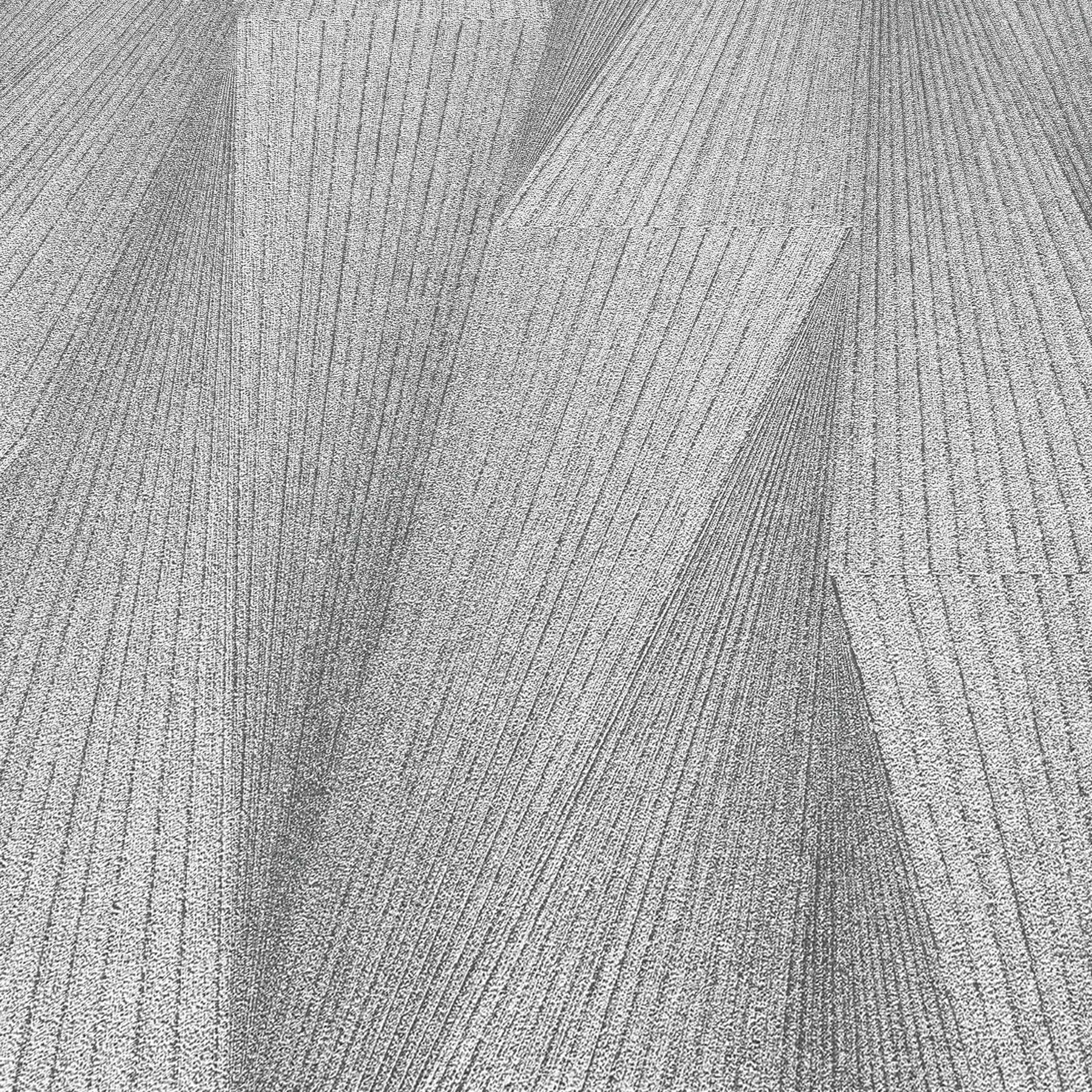 Gray wallpaper close-up with a subtle textured pattern and soft tonal variation across the surface.