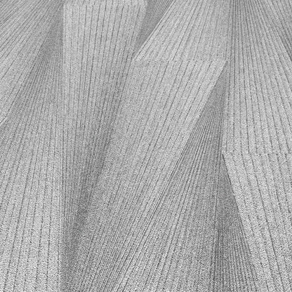 Gray wallpaper close-up with a subtle textured pattern and soft tonal variation across the surface.