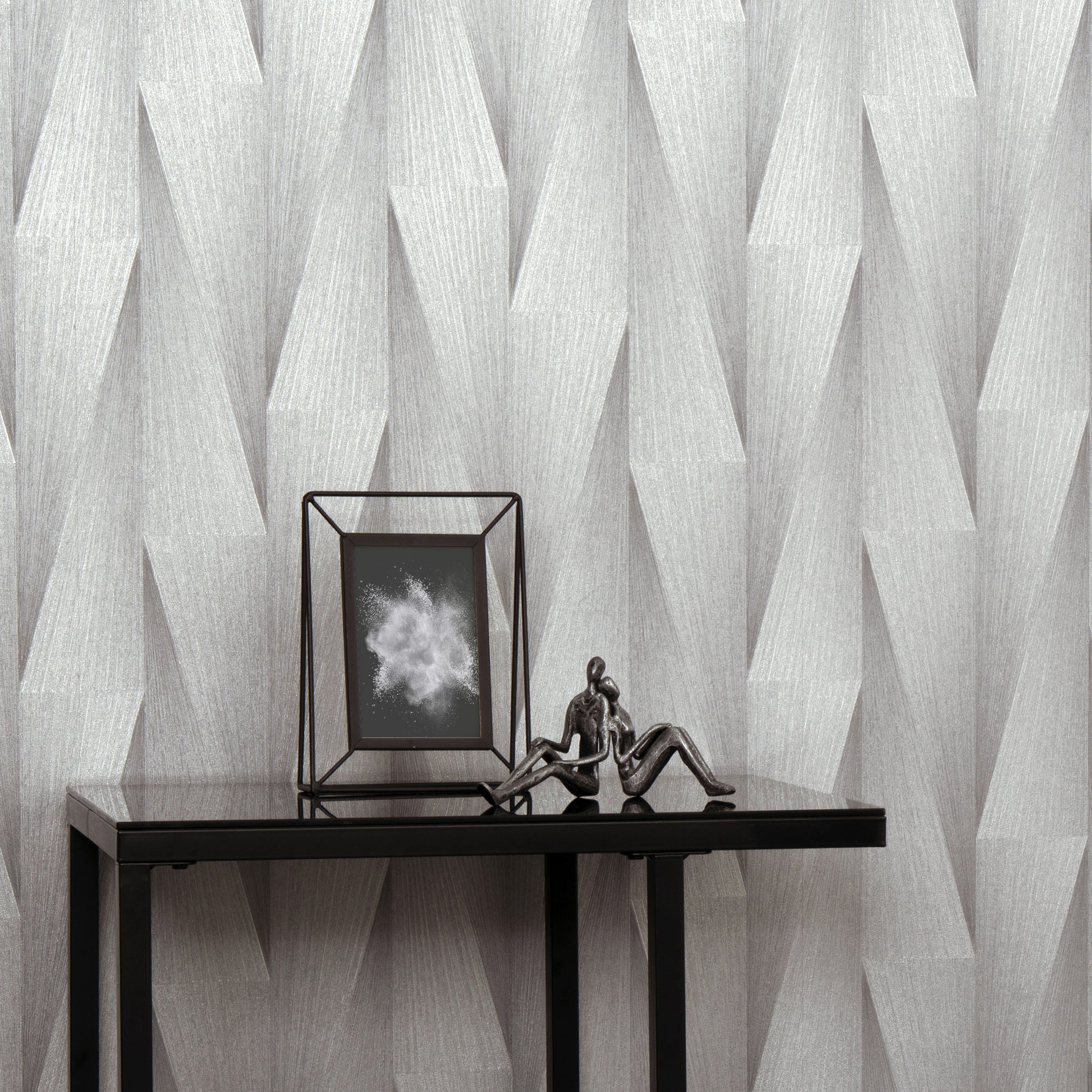 Grey wallpaper with a subtle transitional gray pattern.