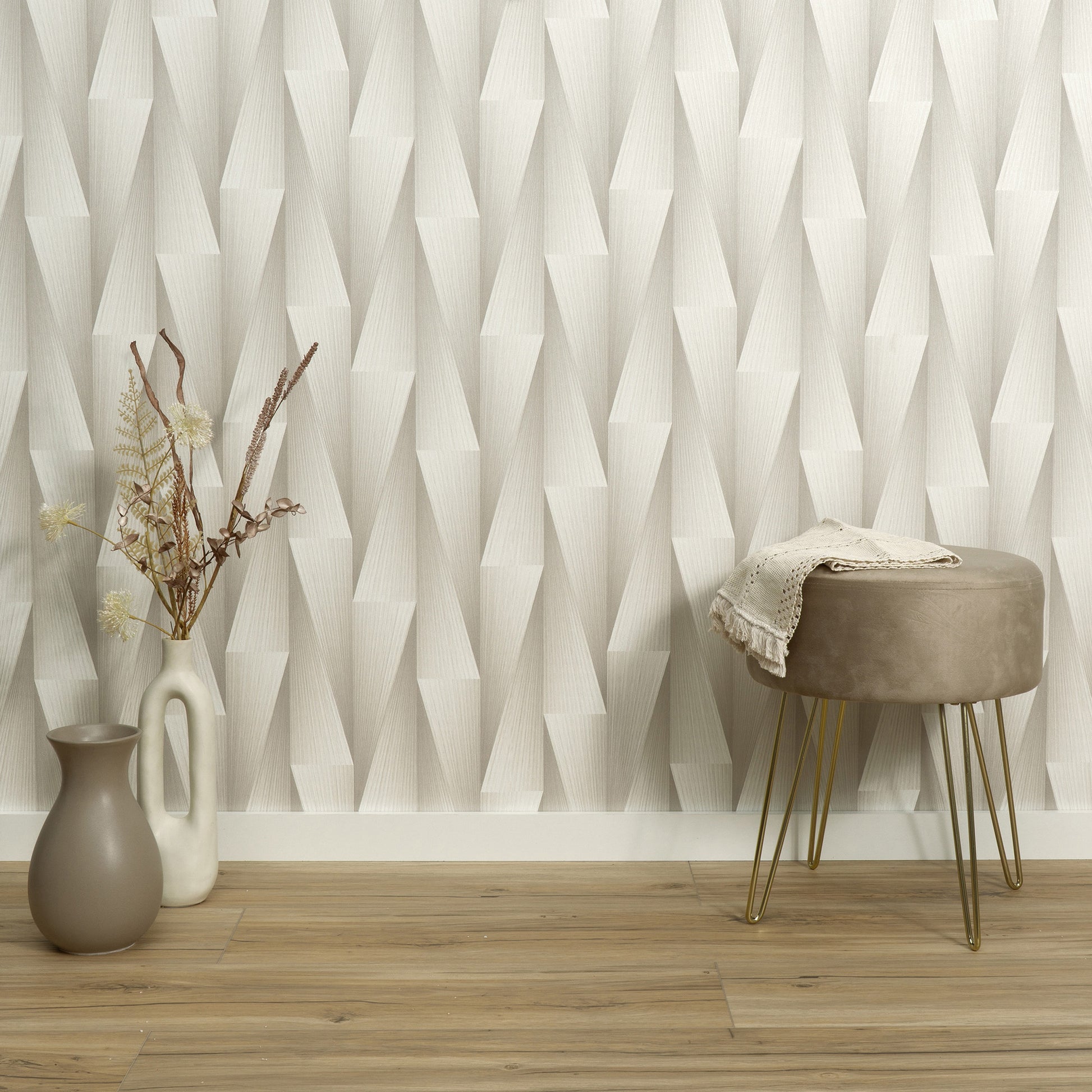 Taupe wallpaper with a subtle 3D geometric pattern.