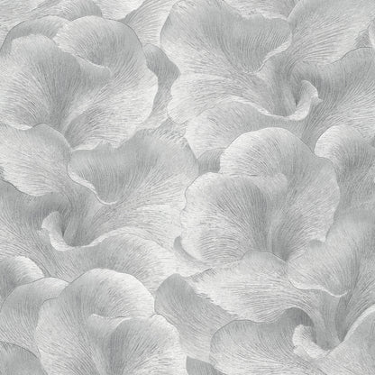 Soft gray wallpaper with large overlapping petal-like shapes and subtle brushed texture.