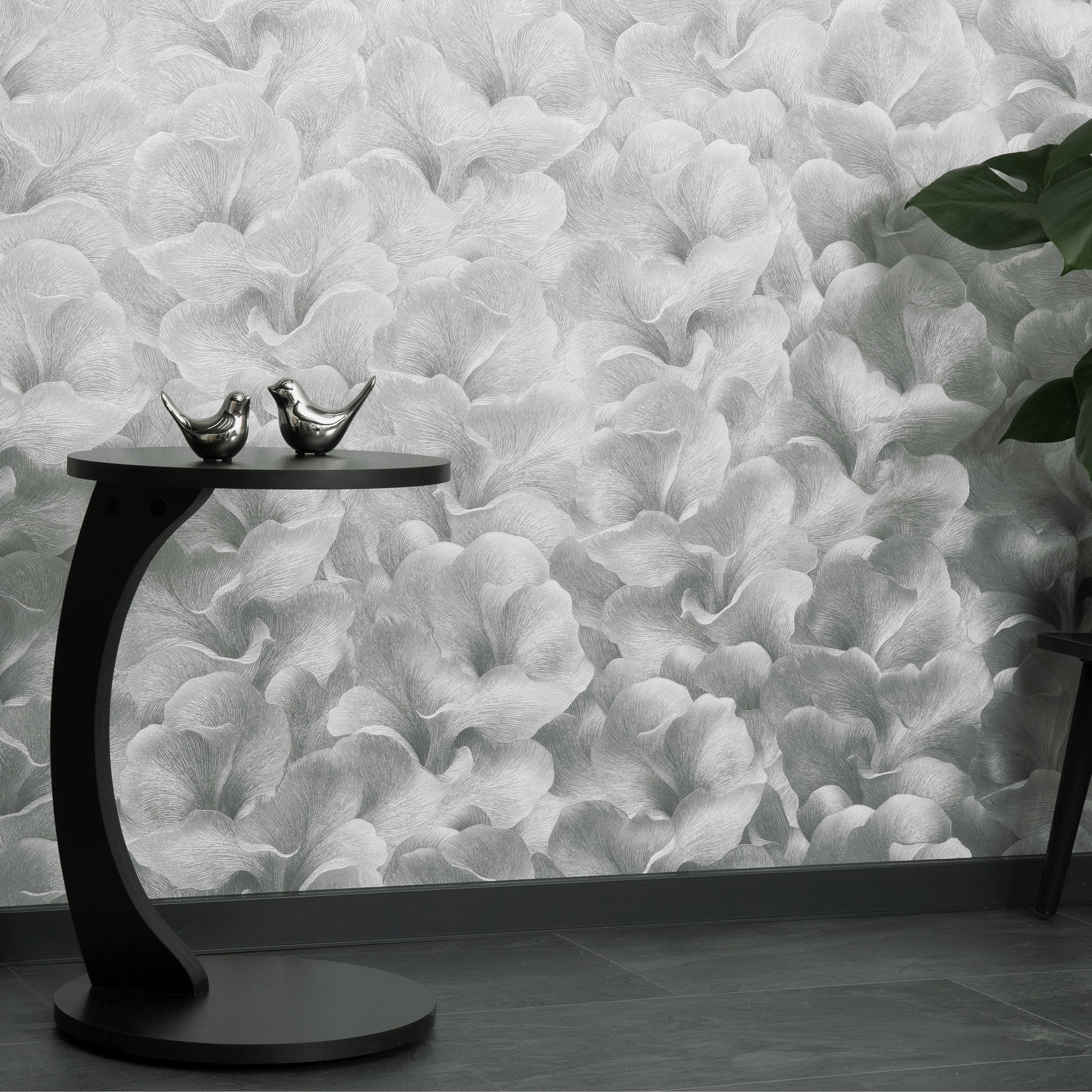 Grey floral wallpaper with a subtle silver glow pattern.