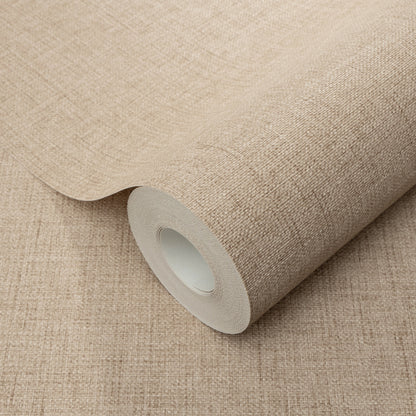 Beige fabric-textured wallpaper roll, partially unrolled, showing woven pattern and inner core.