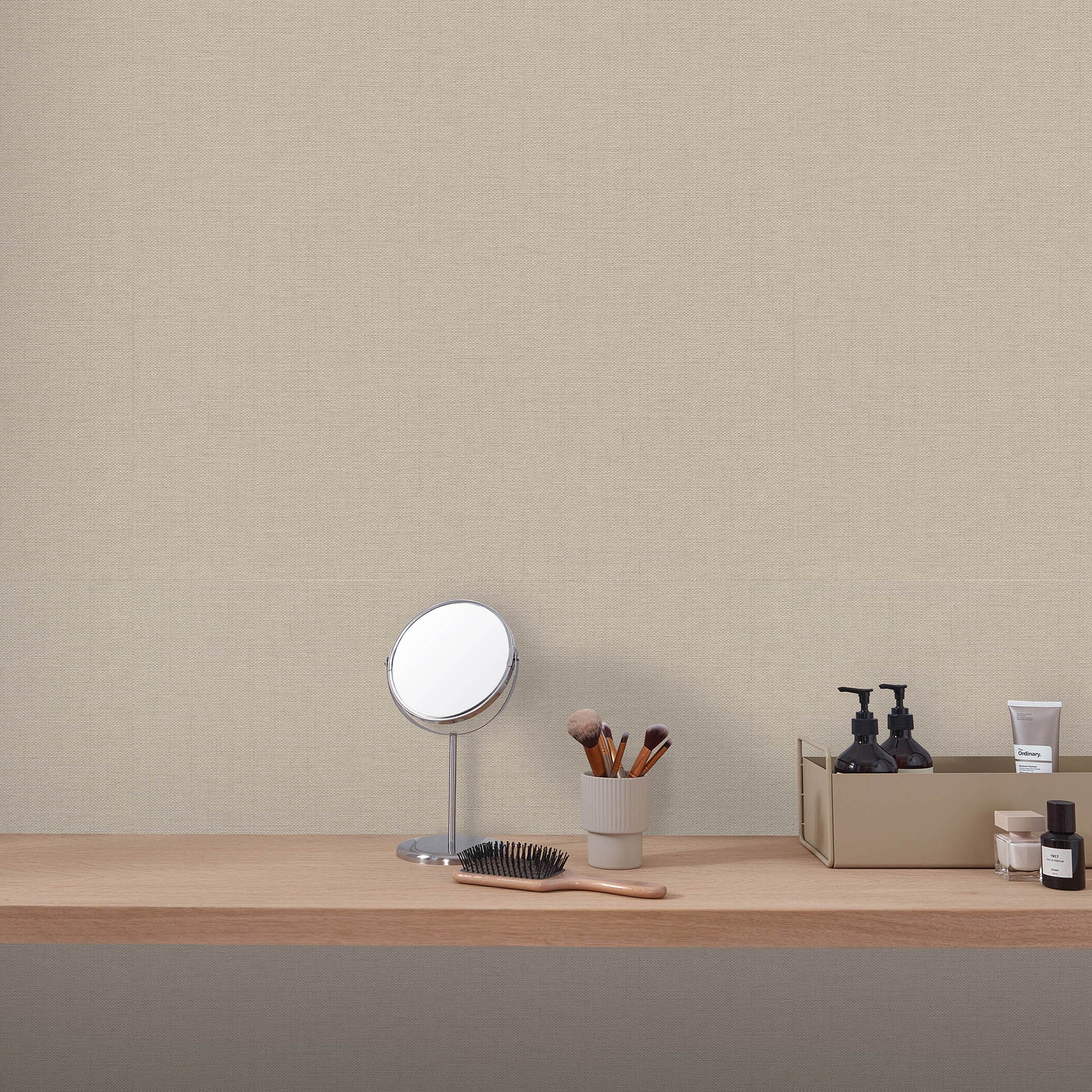 Taupe Echo jute-texture wallpaper with an abstract traditional pattern.