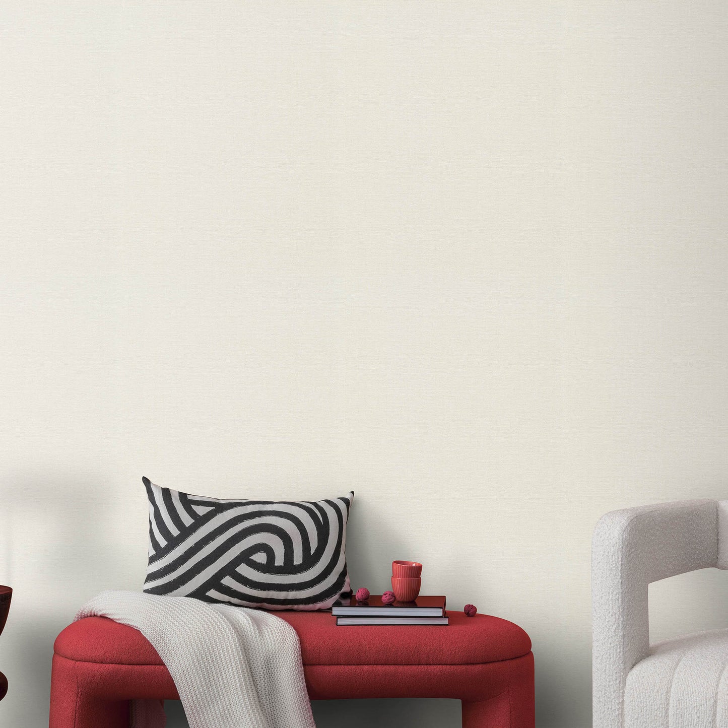 Cream wallpaper with a woven jute texture and an abstract traditional pattern.