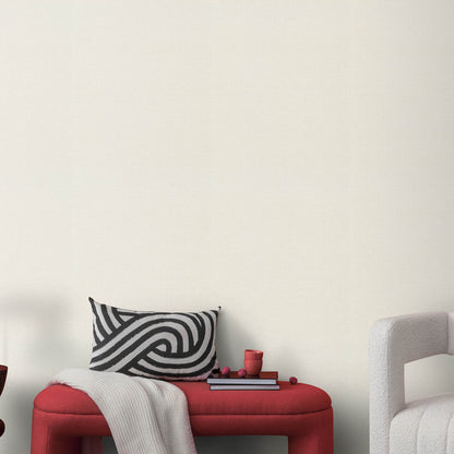 Cream wallpaper with a woven jute texture and an abstract traditional pattern.