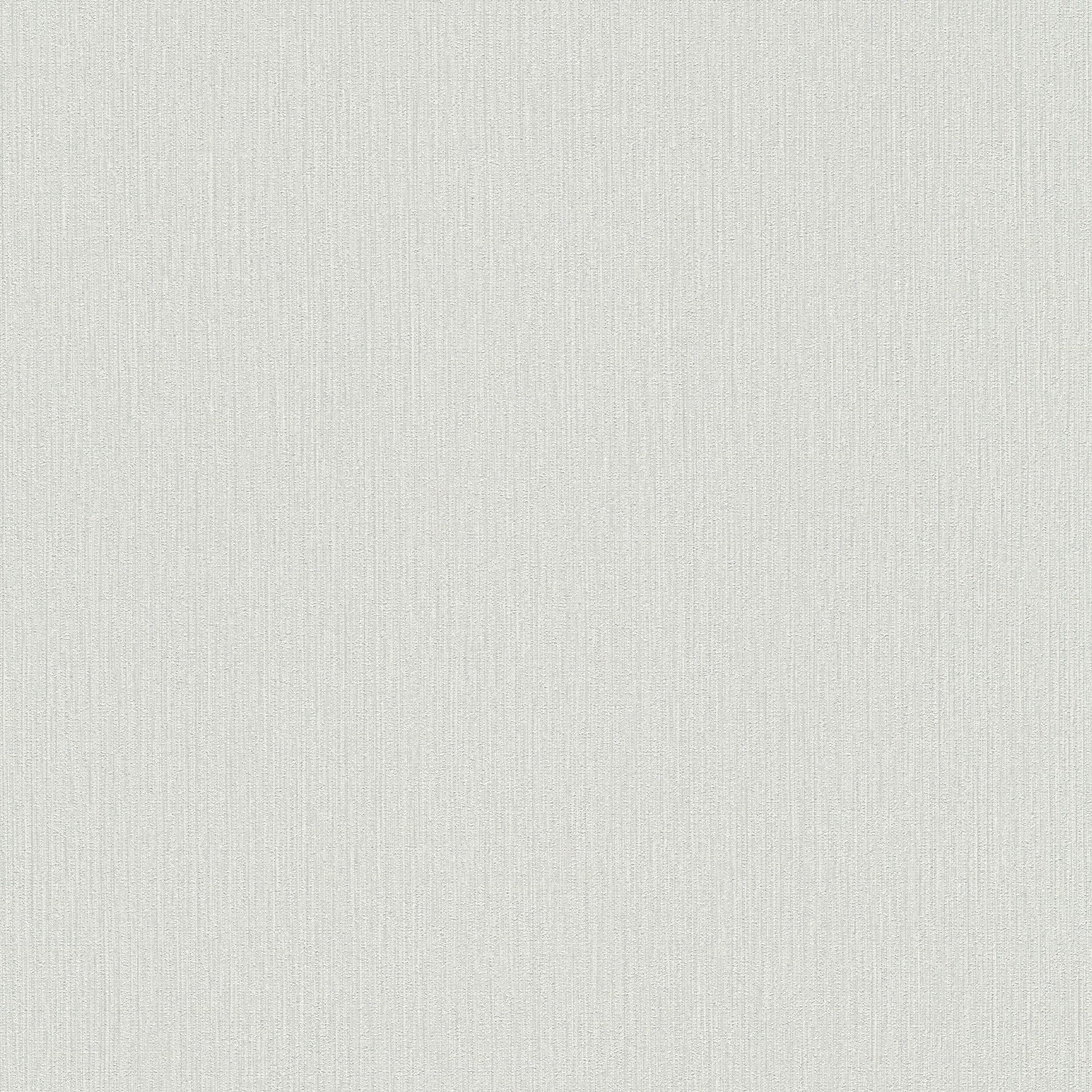 Light gray wallpaper with a subtle ribbed texture and fine vertical lines.