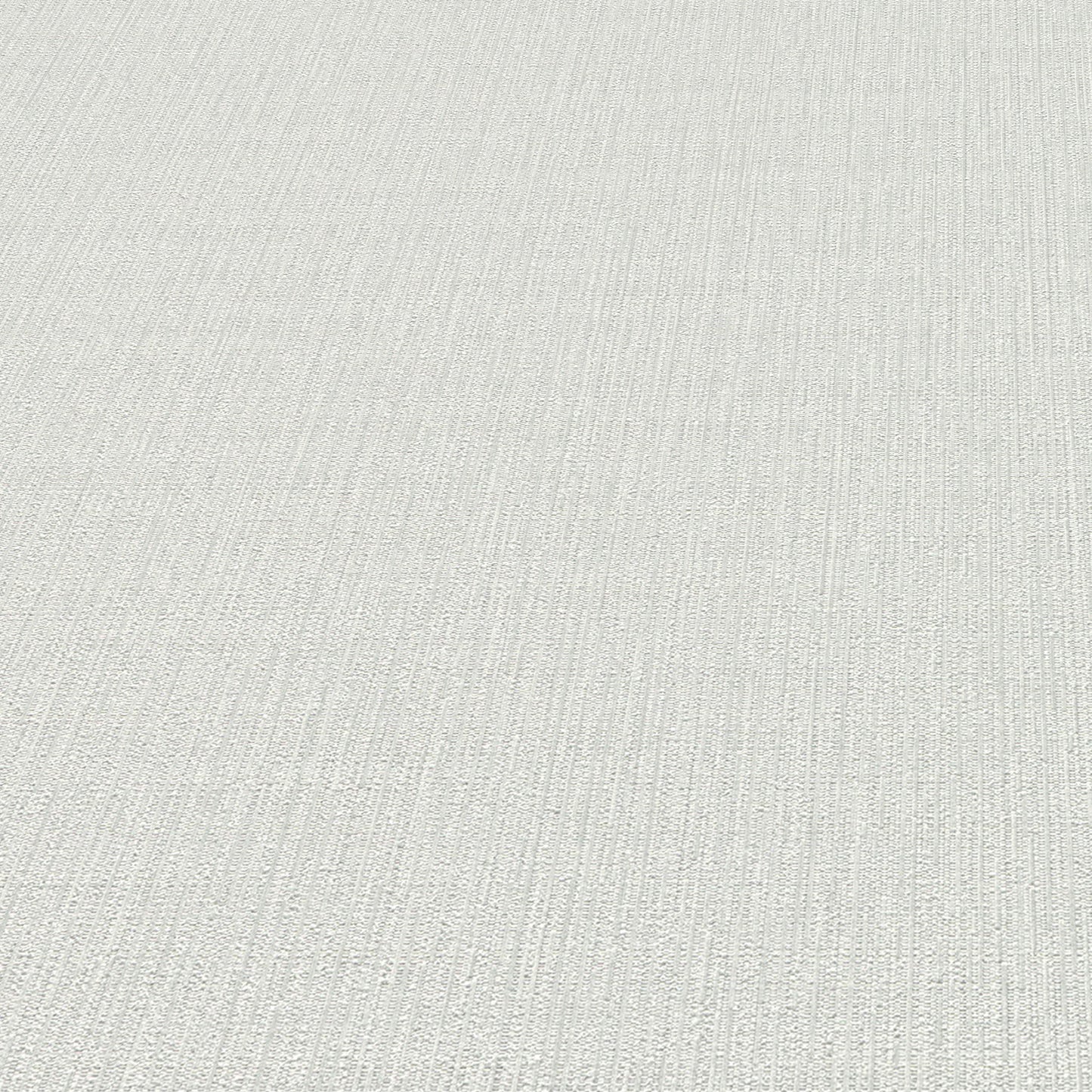 Light gray wallpaper with a subtle linear pattern.