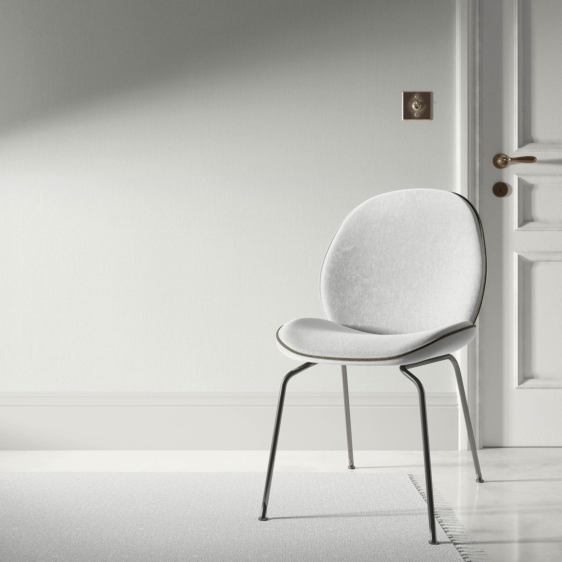 Light gray wallpaper with a subtle stria texture and an abstract traditional gray design.