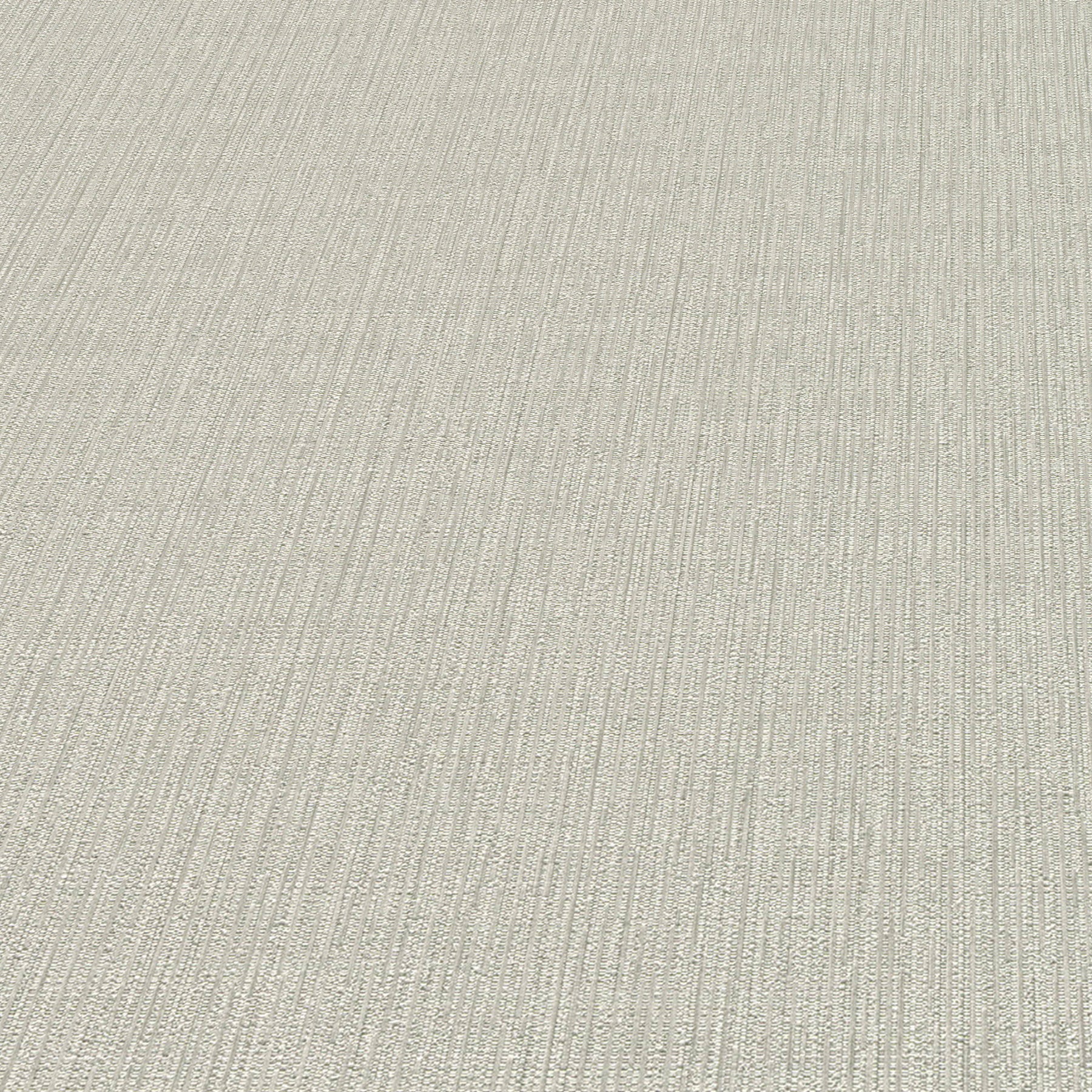 Beige textured wallpaper with fine vertical ribbing; soft loom Stria tan pattern, abstract traditional tan wallpaper.