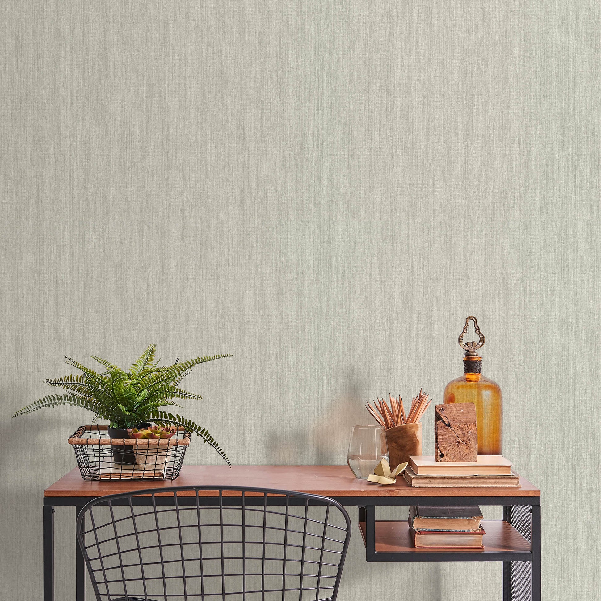 Tan wallpaper with an abstract traditional pattern and a soft loom stria texture.