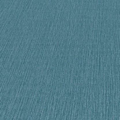 Teal blue ribbed fabric texture with vertical ridges; textile swatch.
