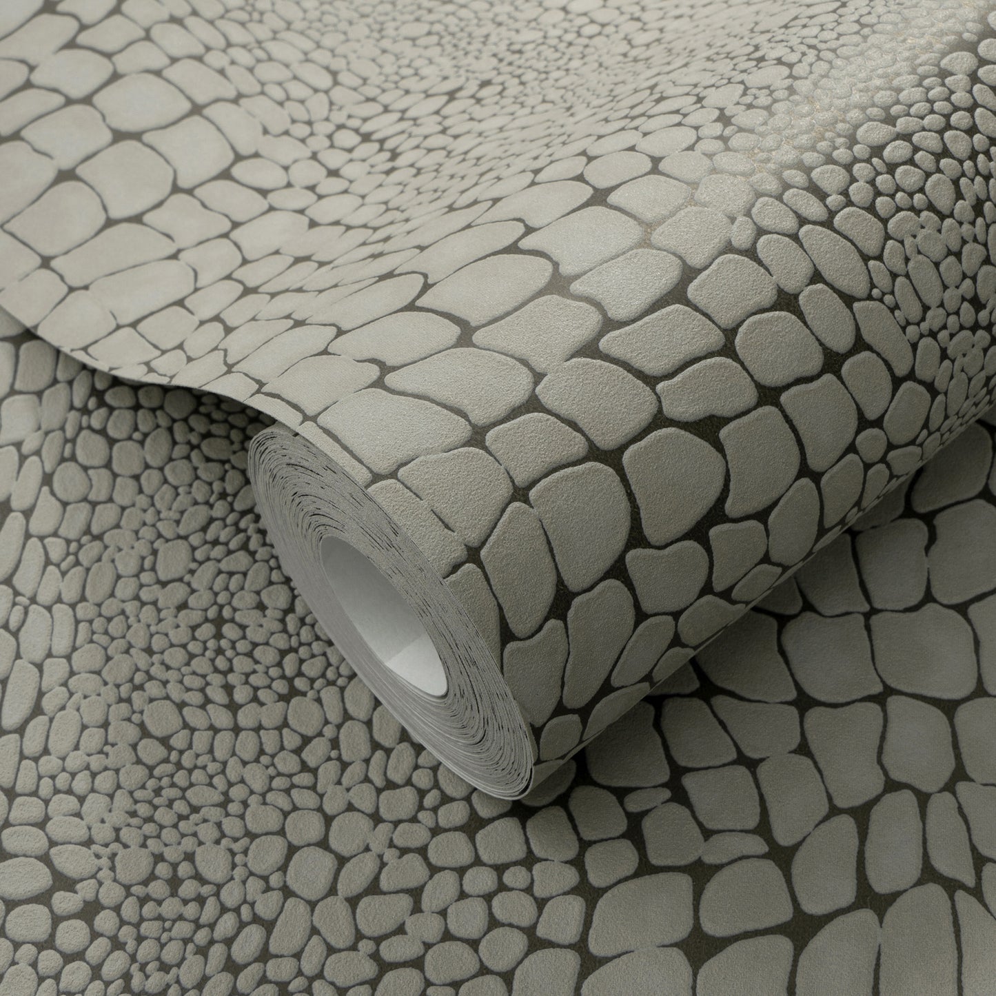 Gray pebble-pattern wallpaper roll with rounded stone shapes for a modern, textured wall covering.