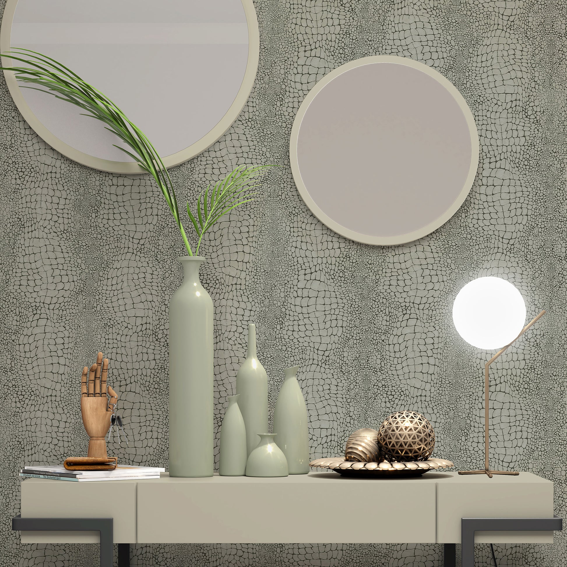 Minimalist decor: pale green ceramic vases, wooden hand sculpture, round mirrors, textured gray wallpaper, spherical lamp.