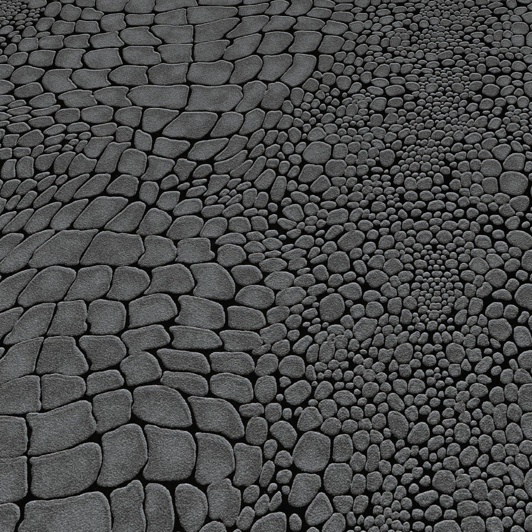 Black crocodile-skin texture wallpaper with a subtle repeating pattern.