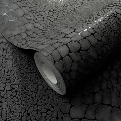 Gray pebble-textured wallpaper roll with faux-stone pattern, rolled edge, ideal for accent walls.