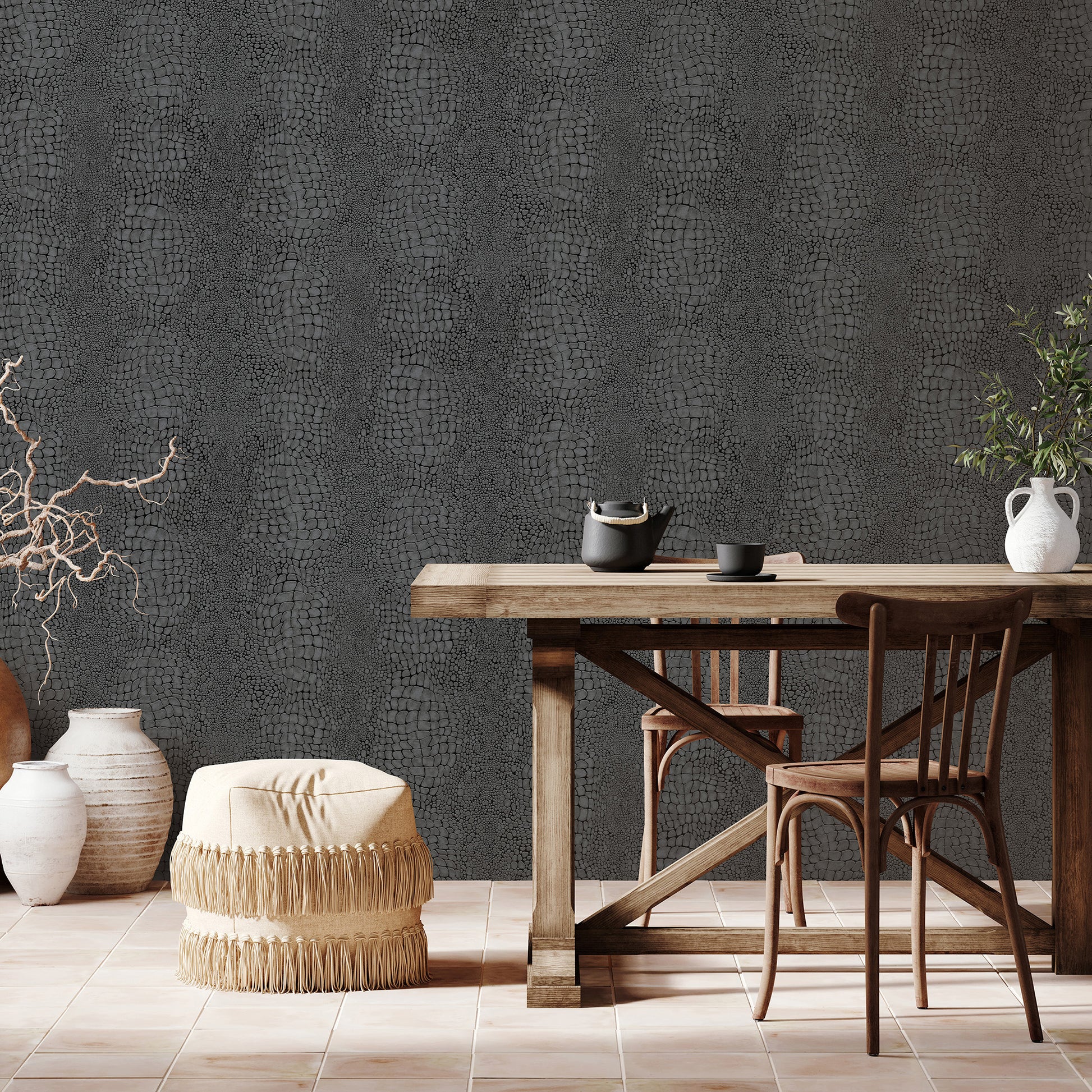 Close-up of black crocodile-skin wallpaper pattern.