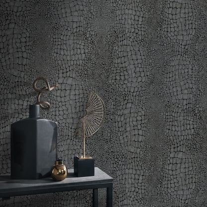 Dark black crocodile-skin wallpaper pattern.