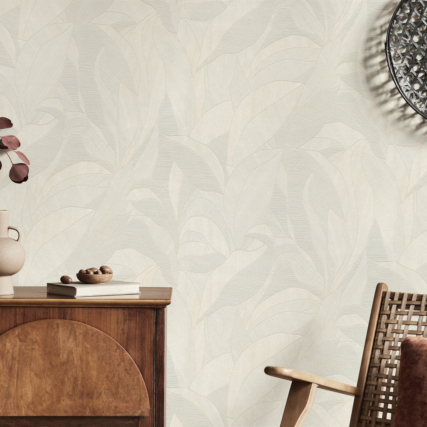 Beige wallpaper featuring a leafy pattern.